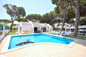 The villa is simply and traditionally furnished and is on one level with a large, Quarteira